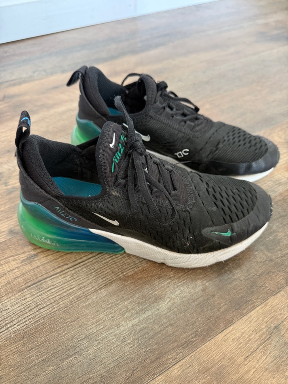 Nike Black Sneakers with Teal and Green Heel Accents